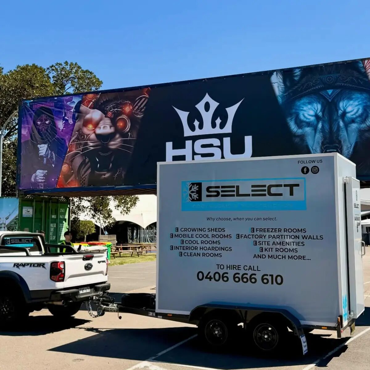 The Select Mobile Coolrooms hire trailer hitched to a ute and being towed on the road